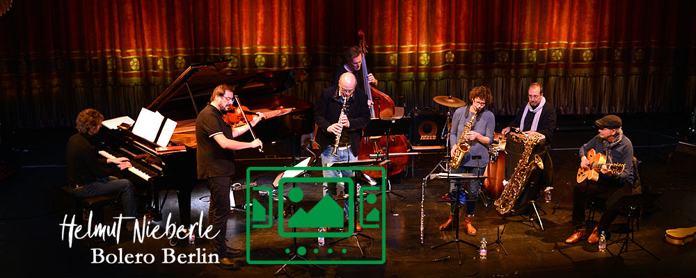 das slideshow-Fenster für 'helmutnieberle.de' anzeigen ...

Martin Stegner (va) - Stephan Holstein (cl) - Raphael Haeger (p) - Esko Laine (b) - Daniel Topo Gioia (perc) - Franzi Forster (fl, sax) - Helmut Nieberle (7-string g)